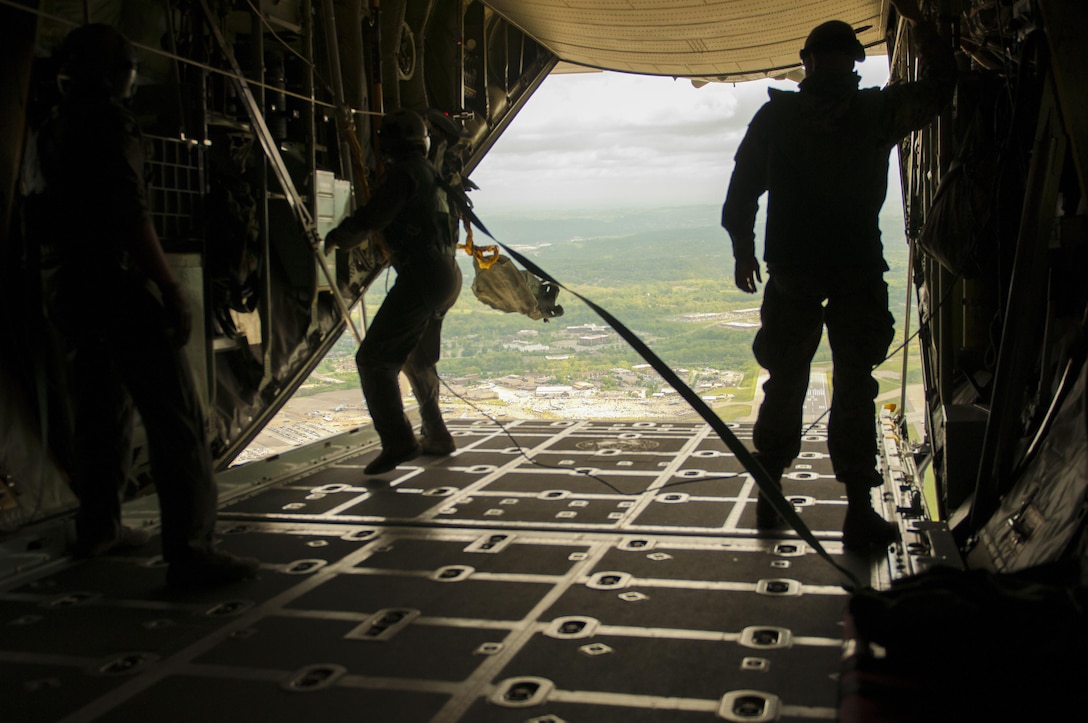 U.S. Air Force loadmasters pull in deployment bags back into a C-130 aircraft from a static line jump on Saturday, March 13, 2017, during the Wings Over Pittsburgh Open House.  The 911th Airlift Wing hosted the 2-day event that collaborated with the Army Reserve, National Guard, and Navy Reserve. (U.S. Army photo by Staff Sgt. Shaiyla Hakeem/Released).