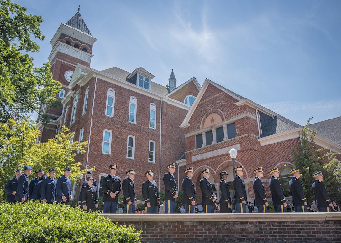 Brand new U.S. Army and Air Force second lieutenants line up in front of  Clemson University’s Tillman Hall to recieve their first salutes after being commissioned in a Reserve Officers’ Training Corps ceremony, May 10, 2017. (U.S. Army Reserve photo by Staff Sgt. Ken Scar)