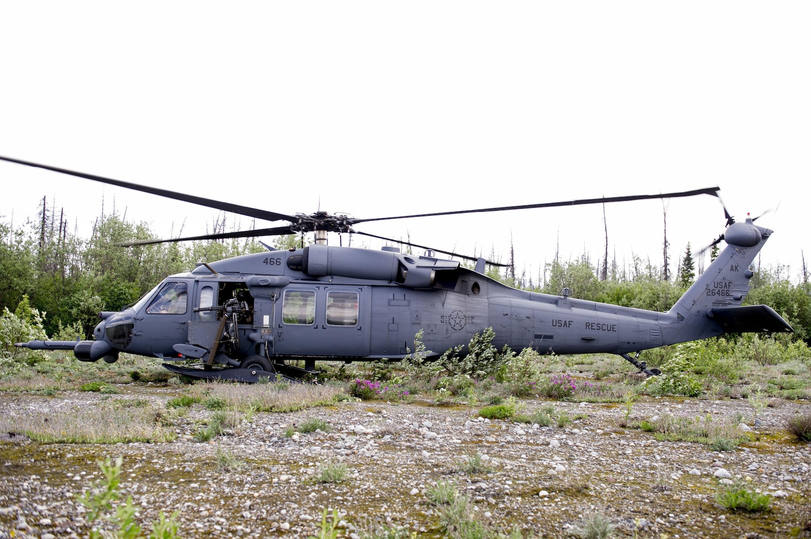 An Alaska Air National Guard HH-60 Pave Hawk helicopter from the 210th Rescue Squadron Detachment 1, Eielson Air Force Base, Alaska prepares to take off June 9, 2016, in the Joint Pacific Alaskan Range Complex. The 210th RQS Det 1 plays a vital role in rescues in the wilderness.
