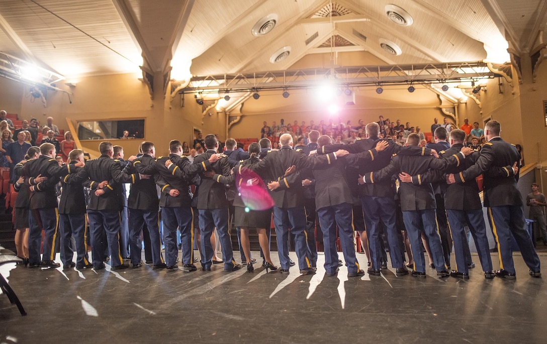 Newly-commissioned U.S. Army and Air Force second lieutenants sing the Clemson University alma mater at the conclusion of their Reserve Officers’ Training Corps commissioning ceremony, May 10, 2017. (U.S. Army Reserve photo by Staff Sgt. Ken Scar)