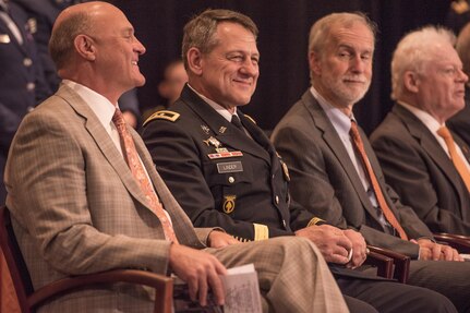 Clemson University president James Clements (left) shares a laugh with U.S. Army Maj. Gen. James B. Linder, commander of the U.S. Army John F. Kennedy Special Warfare Center, during Clemson’s Reserve Officers’ Training Corps commissioning ceremony, May 10, 2017. Linder is a 1983 graduate of Clemson. (U.S. Army Reserve photo by Staff Sgt. Ken Scar)