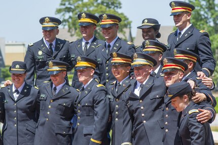 A group of brand new U.S. Army second lieutenants pose for pictures after their commissioning ceremony at Clemson University, May 10, 2017. (U.S. Army Reserve photo by Staff Sgt. Ken Scar)