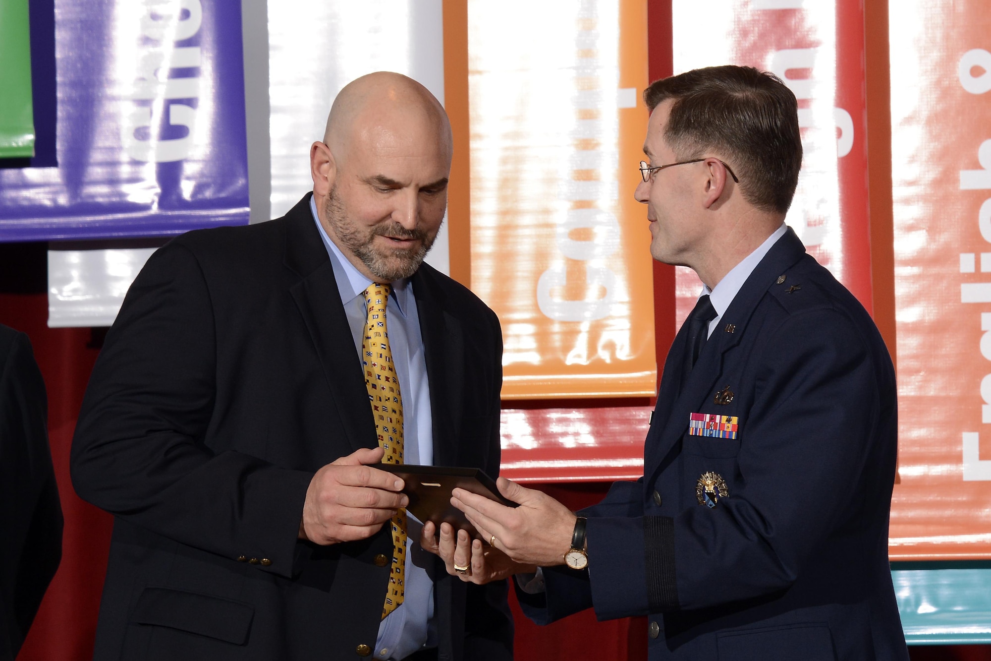 Charles Steele receives the Heiser Award from Dean of Faculty Brig. Gen. Andrew Armacost, May 5, 2017 at the U.S. Air Force Academy. Steele is a history professor at the Academy. The Heiser award is named after Professor Emeritus Dr. William H.
Heiser and given to faculty members who contribute to cadets' development. (U.S. Air Force photo/Darcie Ibidapo)