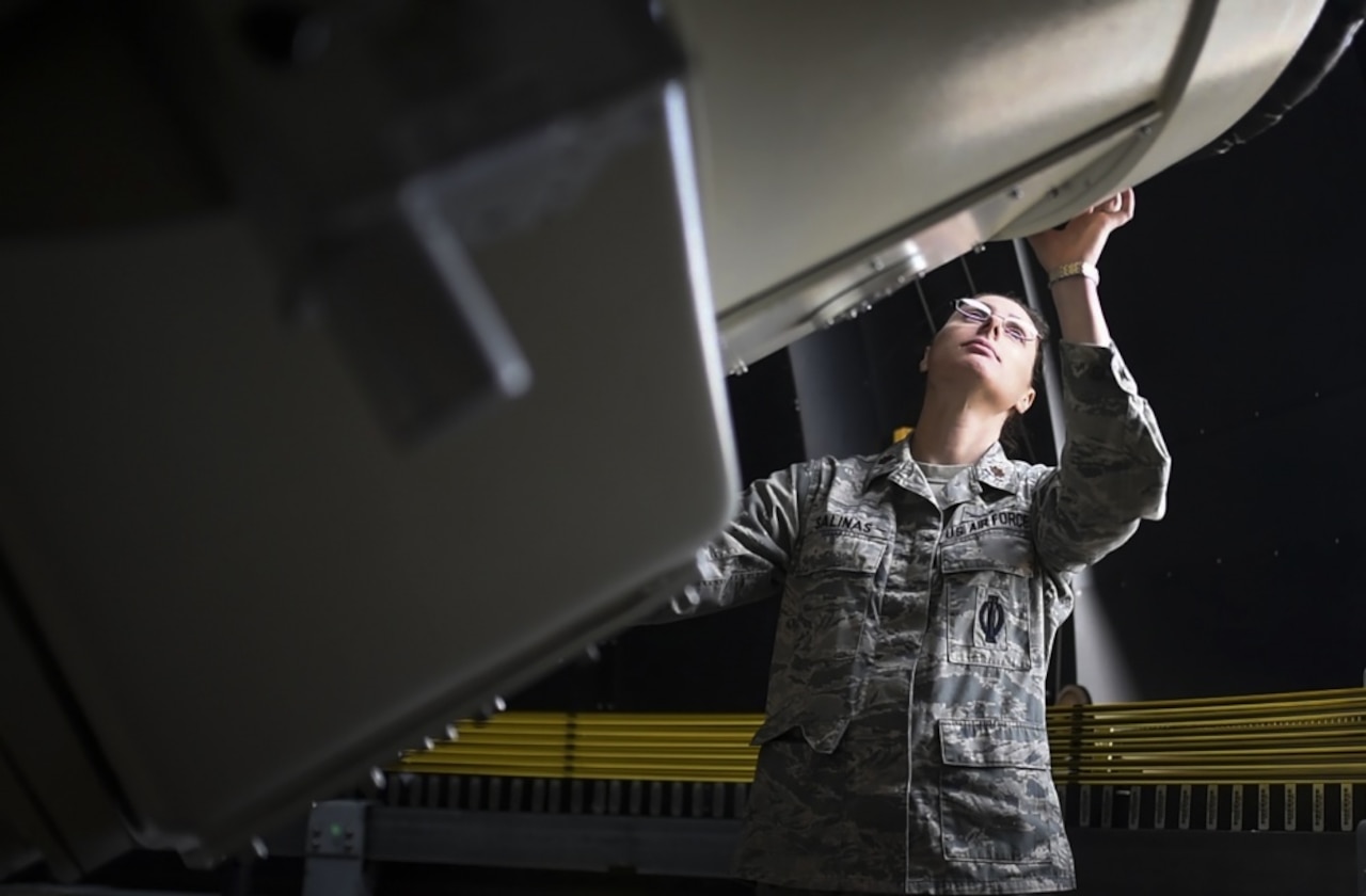 Air Force Maj. Erin Salinas demonstrates the mobility of a Ground-Based Electro-Optical Deep-Space Surveillance telescope at White Sands Missile Range, N.M., April 27, 2017. Air Force photo by Airman 1st Class Dennis Hoffman