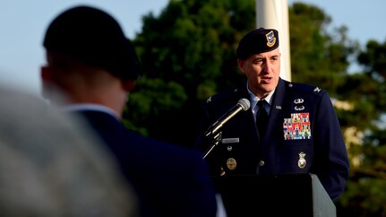 U.S. Air Force Col. Erik Rundquist, Air Combat Command chief of security forces, speaks during the National Police Week opening ceremony at Joint Base Langley-Eustis, Va., May 15, 2017. In 1962, President John F. Kennedy signed Public Law 87-726 designating May 15 as Peace Officers' Memorial Day, and the week in which May 15 falls as National Police Week. (U.S. Air Force photo/Staff Sgt. Areca T. Bell)