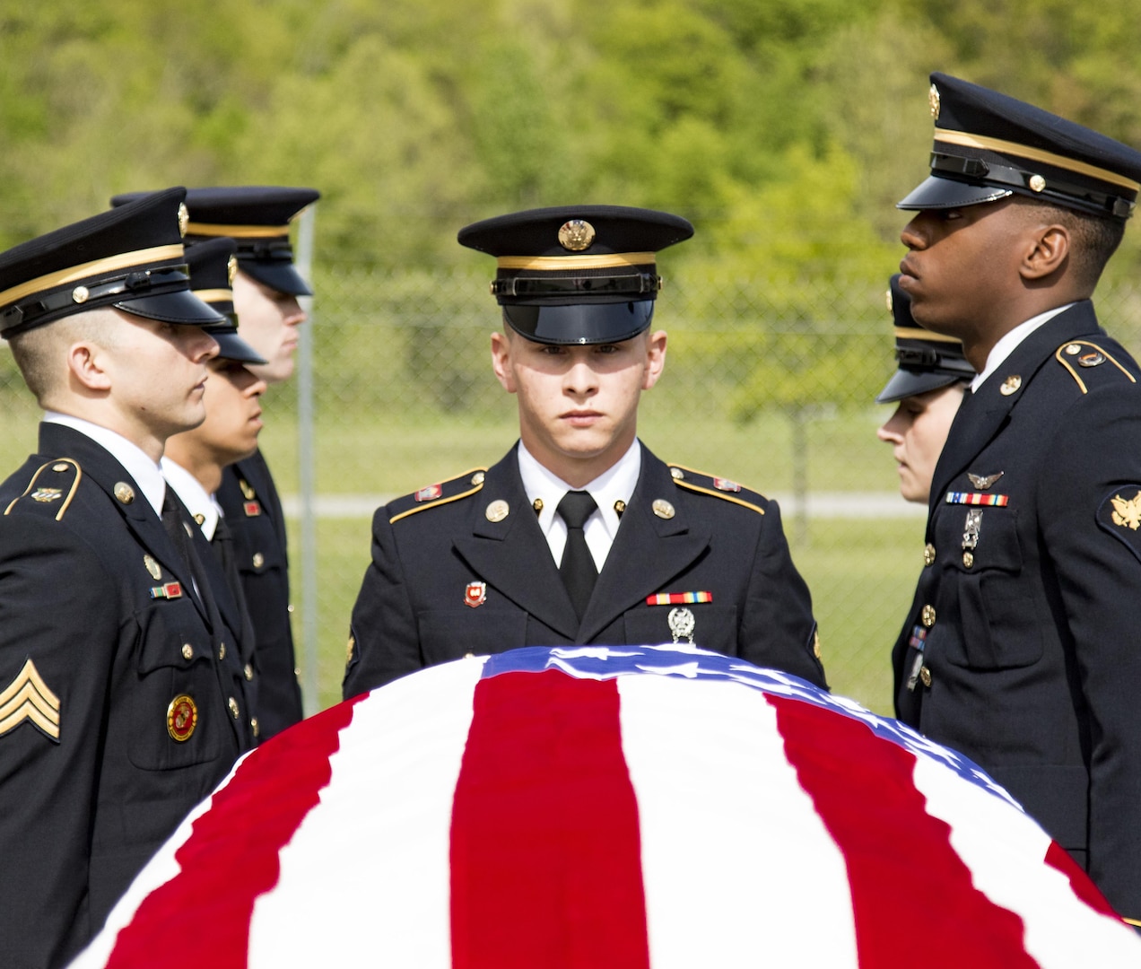 Four New York Army National Guard Soldiers, along with eight other Army National Guard Soldiers from across the country, rehearse the movements and commands of a full military funeral during the 80-hour, Train-the-trainer Military Funeral Honors course at Camp Smith Training Site May 11, 2017. 