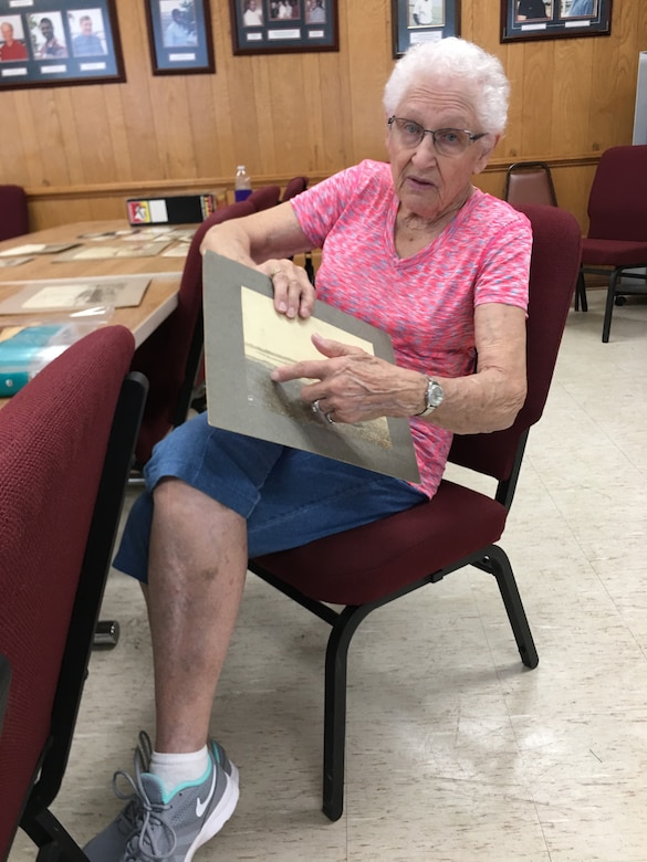 Mary Tiedgen shares information and photos about her grandfather, Capt. J.W. Rouse, with Andrea Williams, Ensley Engineer Yard Plant Section chief.
