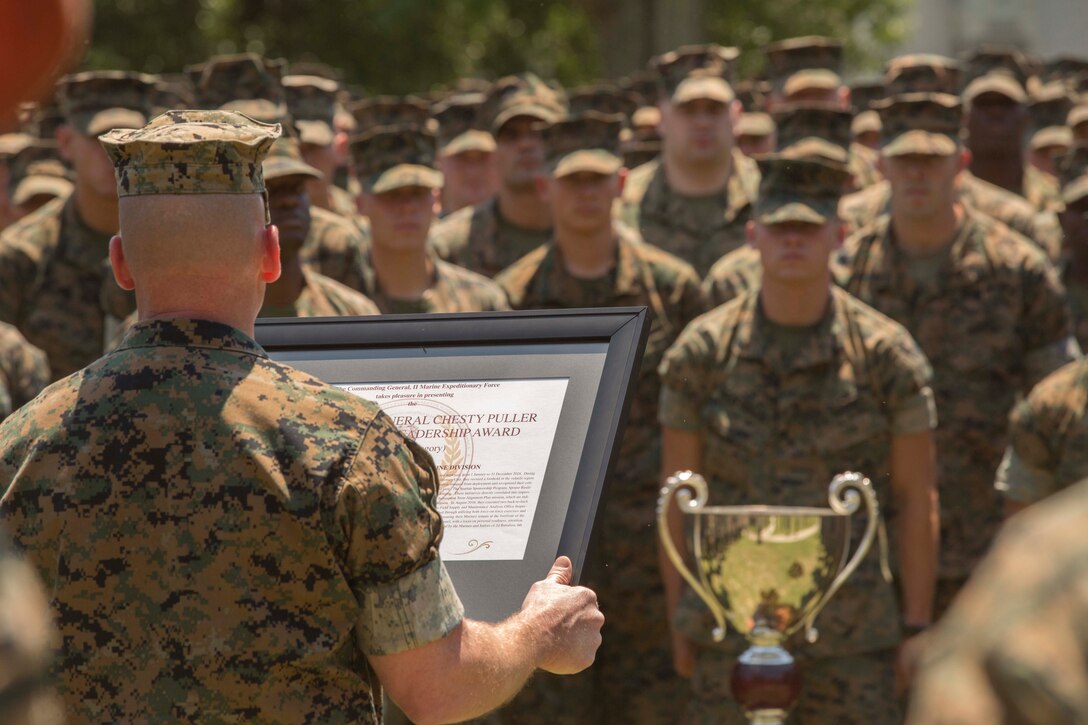 Major Gen. John K. Love, the commanding general of 2nd Marine Division, speaks to Marines during a Chesty Puller award ceremony at Camp Lejeune, N.C., May 15, 2017. The Marines earned the award due to their impressive conduct in combat, garrison and in the field of innovation throughout the calendar year of 2016. The Marines are with 2nd Battalion, 6th Marine Regiment, 2nd Marine Division. (U.S. Marine Corps photo by Pfc. Abrey D. Liggins)