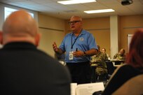 Mr. Marcelo Rolon, COOP Instructor, briefs on the importance of COOP planning during Continuity of Operations training held at the Major General Felix A. Santoni building on Fort Buchanan, May 11.