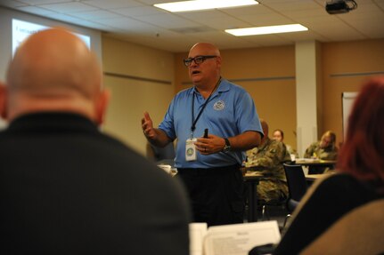 Mr. Marcelo Rolon, COOP Instructor, briefs on the importance of COOP planning during Continuity of Operations training held at the Major General Felix A. Santoni building on Fort Buchanan, May 11.