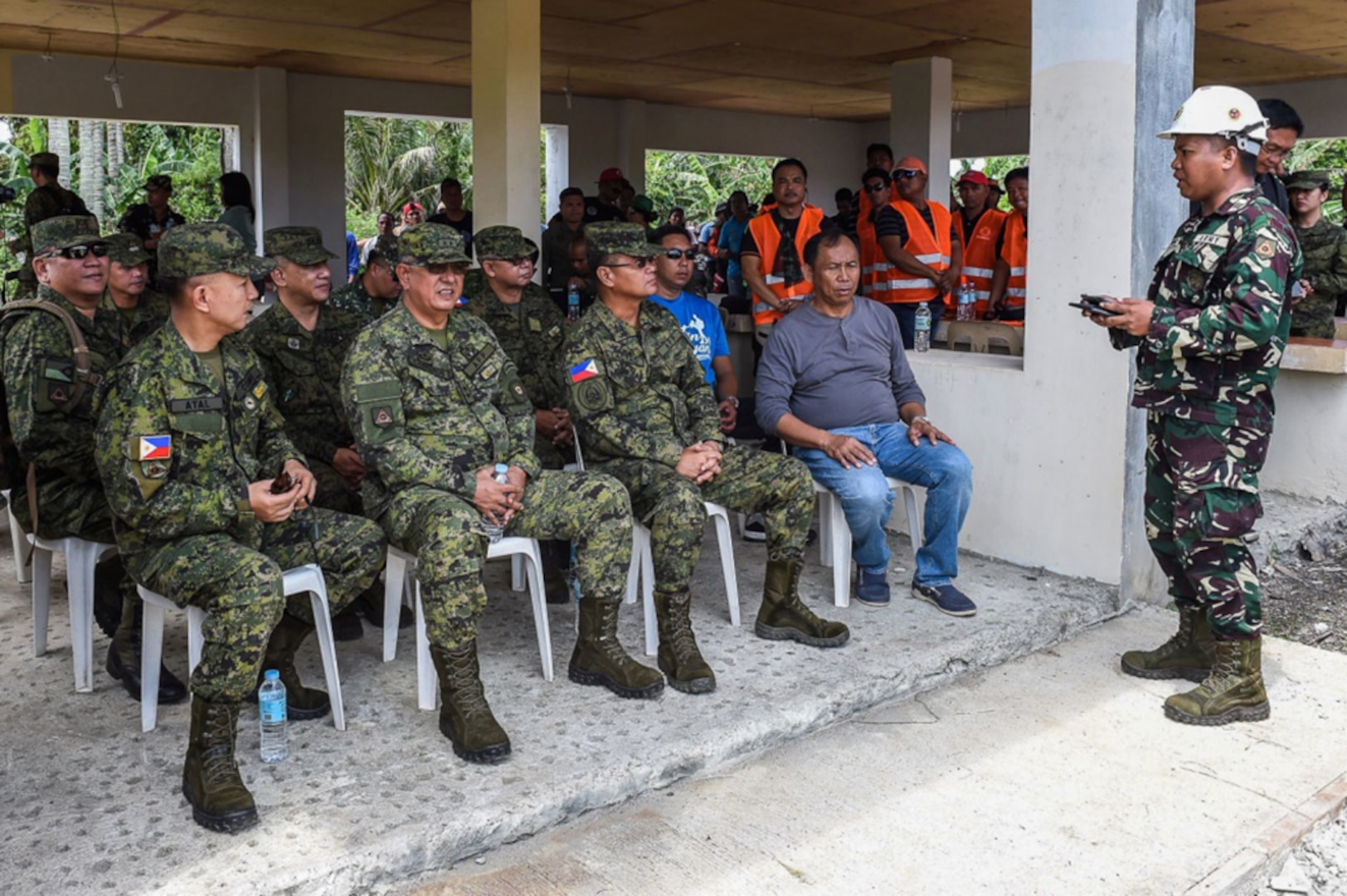 Philippine Army general officers and the Mayor of Calayan receive a brief during a simulated mass casualty scenario in support of Balikatan 2017 on the island of Calayan May 16, 2017. By training together the Philippine and U.S. military build upon shared tactics, techniques, and procedures that enhance readiness and response capabilities to natural disasters. Balikatan is an annual U.S.-Philippine bilateral military exercise focused on a variety of missions, including humanitarian assistance and disaster relief, counterterrorism, and other combined military operations. 