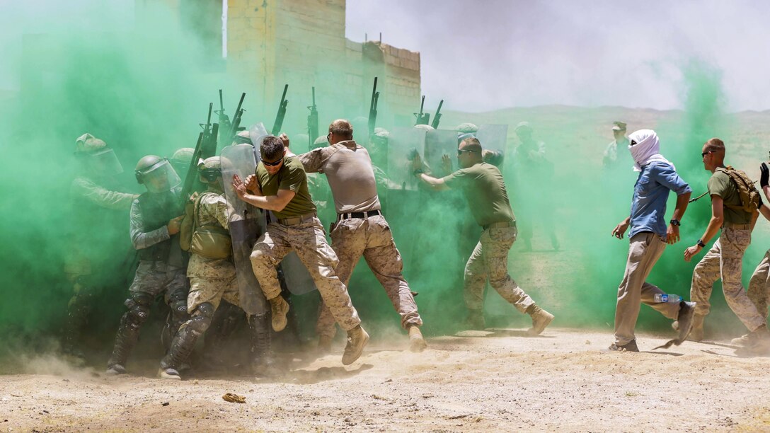 Marines participate in a nonlethal weapons and tactics course with Jordanian troops during Eager Lion 17 in Jordan, May 11, 2017. Eager Lion is an annual U.S. Central Command exercise designed to strengthen military-to-military relationships between the U.S., Jordan and other international partners. The Marines are assigned to Military Police Company Alpha, 4th Law Enforcement Battalion. Marine Corps photo by Staff Sgt. Vitaliy Rusavskiy