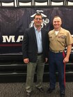 Colonel Jason Morris speaks to a group of university wrestling coaches and leaders, today, about the values Marines and wrestlers share during the NWCA leadership academy in Edwardsville, Illinois. He talked about the three missions of the U.S. Marine Corps - make Marines, win our nation’s battles and develop quality citizens - and spoke about how to adapt them so the coaches in attendance could grow wrestling. His speech focused on how training is the most important part of a leader’s job, whether it is preparing a team for battle or the wrestling mat.