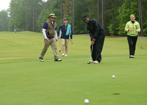 Donnie Tuck, City of Hampton mayor, hits a golf ball during the Spring 2017 Commander’s Cup at Joint Base Langley-Eustis, Va., May 12, 2017. The golf tournament occurs annually to promote comradery between service members and the Hampton Roads community. (U.S. Air Force photo/Airman 1st Class Kaylee Dubois)