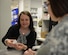 Dr. Jessica Pruitt, McDonald Army Health Center lead pharmacist, discusses a prescription with a patient at Joint Base Langley-Eustis, Va., May 9, 2017. Pharmacists and technicians are responsible for ensuring prescriptions are given to the right patient with the correct dosage, frequency and instructions on the label. (U.S. Air Force photo/Staff Sgt. Teresa J. Cleveland)