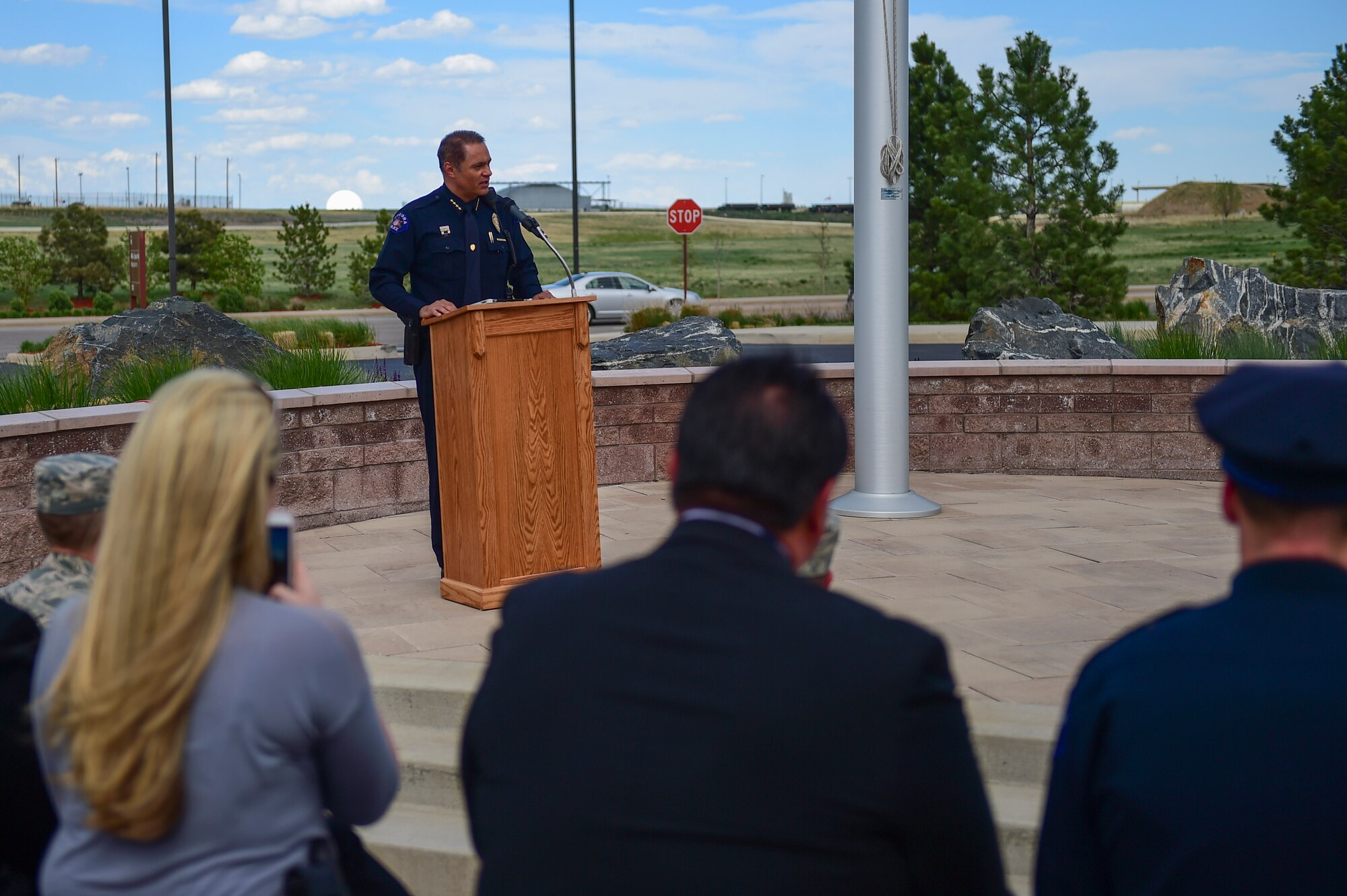 Chief Nick Metz, the City of Aurora Police Chief, speaks at the Retreat ceremony May 15, 2017, on Buckley Air Force Base, Colo. The Retreat ceremony recognizes fallen civilian and military law enforcement officers with the 21-gun salute, the playing of TAPS and the National Anthem. (U.S. Air Force photo by Airman Jacob Deatherage/Released)