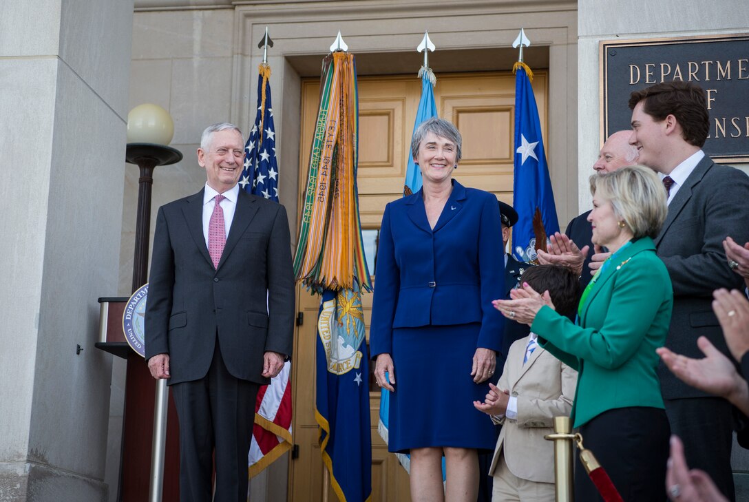 Family members and attendees applaud after Defense Secretary Jim Mattis swears in Heather Wilson as the 24th secretary of the Air Force at the Pentagon, May 16, 2017. Wilson is a U.S. Air Force Academy graduate and former New Mexico representative. She will be responsible for organizing, training and equipping 660,000 active-duty, Guard, Reserve and civilian Airmen, as well as managing a $132 billion budget. DoD photo by Air Force Tech. Sgt. Brigitte N. Brantley