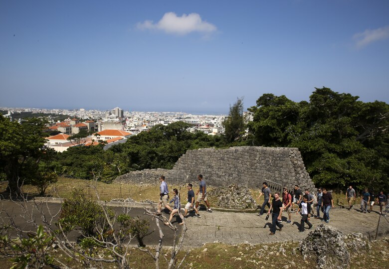 Marines with the 31st Marine Expeditionary Unit hike through Hacksaw Ridge, Okinawa, Japan, May 4, 2017. The Marines, non-commissioned officers with the MEU, visited World War II battle sites throughout Okinawa as part of a Marine Corps Community Services tour that was intended to boost morale throughout the NCO corps of the 31st MEU and sharpen the Marines’ mental readiness. As the Marine Corps’ only continuously forward deployed unit, the 31st Marine Expeditionary Unit’s air-ground-logistics team provides a flexible force, ready to perform a wide range of military operations, from limited combat to humanitarian assistance operations, throughout the Asia-Pacific region. (U.S. Marine Corps photo by Sgt. Tiffany Edwards)
