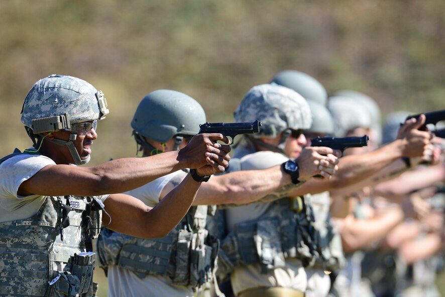 Security forces defenders from the 502nd Security Readiness Group at Joint Base San Antonio complete quick reaction shooting drills at the Combat Arms Training and Maintenance range at the JBSA-Lackland Medina Annex May 4, 2017. Airmen participated in a 5-day Special Weapons and Tactics (SWAT) training course taught by members of the Alamo Area Council of Governments Regional Law Enforcement Academy, which aims to strengthen incident response techniques and build effective law enforcement teams. Officers certified as trainers from police departments around San Antonio area teach the course, which serves as both a refresher course for defenders and an opportunity to foster partnerships between local law enforcement members and JBSA defenders. (U.S. Force photo by Andrew C. Patterson) 