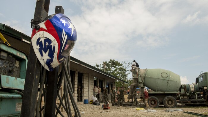 U.S. Air Force and Marines pour concrete into a structure during Balikatan 2017 in Ormoc City, Leyte, April 29, 2017. U.S. military and Australian Army engineers worked together with Philippine service members to build new classrooms at Margen Elementary School in Ormoc City. Balikatan is an annual U.S.-Philippine military bilateral exercise focused on a variety of missions, including humanitarian assistance and disaster relief, counterterrorism, and other combined military operations. (U.S. Air Force photo by Staff Sgt. Peter Reft)