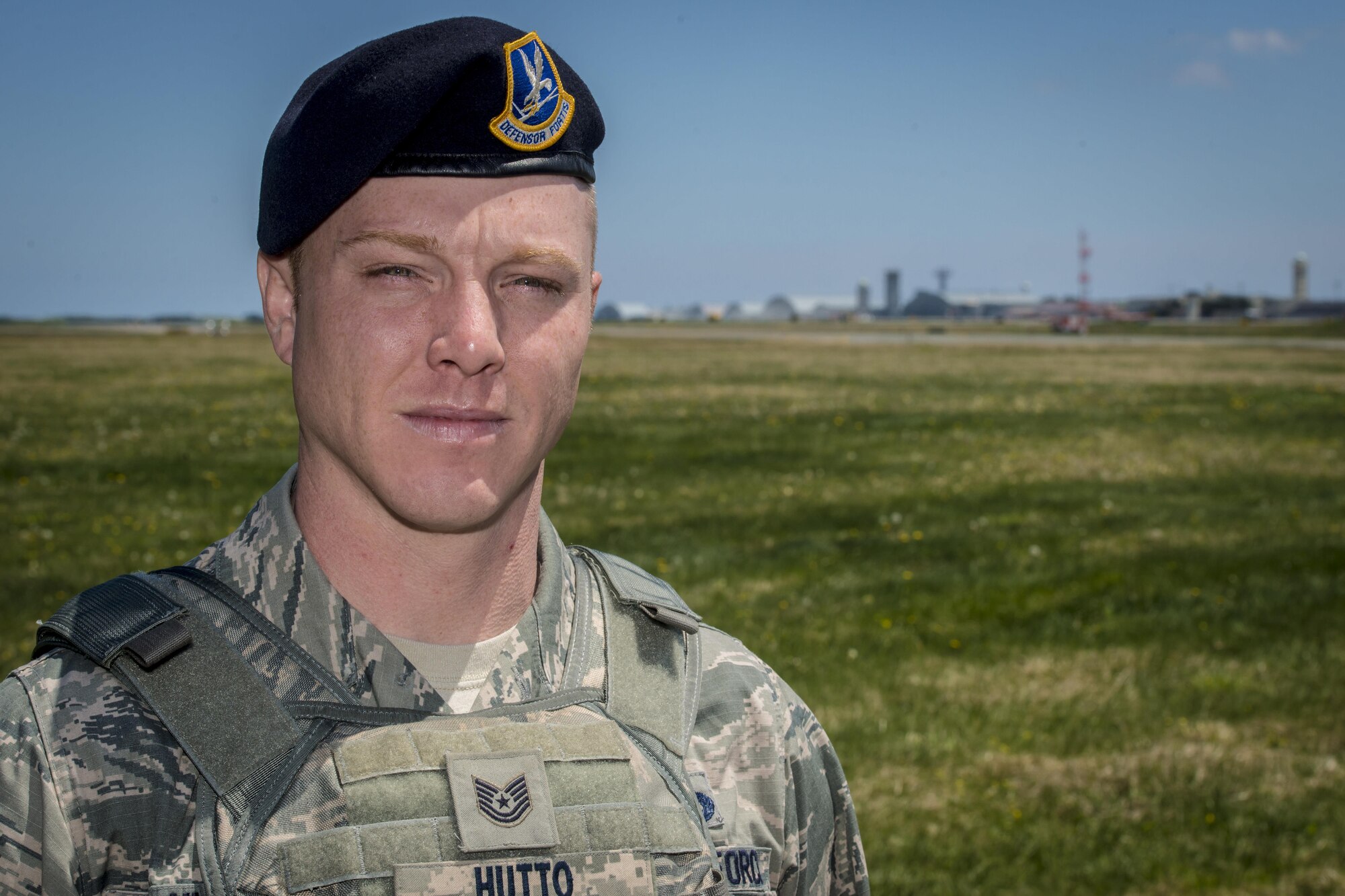 U.S. Air Force Tech. Sgt. Shannon Hutto, a 35th Security Forces Squadron flight chief, poses for a photo overlooking the flight line at Misawa Air Base, Japan, May 17, 2017. Deployments, TDYs and permanent changes of station, all epitomize the life of a U.S. military NCO. Hutto’s seen more combat than most Airmen see in their entire career and spent months, totaling years, away from his family. All these experiences have taught this Enterprise, Alabama, native what it takes to be a leader in today’s Air Force. (U.S. Air Force photo by Tech. Sgt. Benjamin W. Stratton)