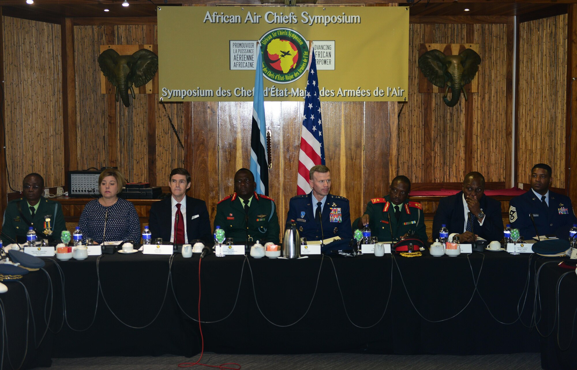 Attendees of the 2017 African Air Chiefs Symposium listen to air chiefs introductions during the opening ceremony in Kasane, Botswana on May 16, 2017. The purpose of the symposium is to create a forum for air chiefs from across the African continent to come together to address regional and continental issues, enhance relationships and increase cooperation. This year's conference will focus on the training aspect of force development. (U.S. Air Force photo by Staff Sgt. Krystal Ardrey)