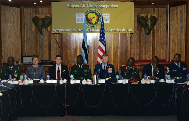 Attendees of the 2017 African Air Chiefs Symposium listen to air chiefs introductions during the opening ceremony in Kasane, Botswana on May 16, 2017. The purpose of the symposium is to create a forum for air chiefs from across the African continent to come together to address regional and continental issues, enhance relationships and increase cooperation. This year's conference will focus on the training aspect of force development. (U.S. Air Force photo by Staff Sgt. Krystal Ardrey)