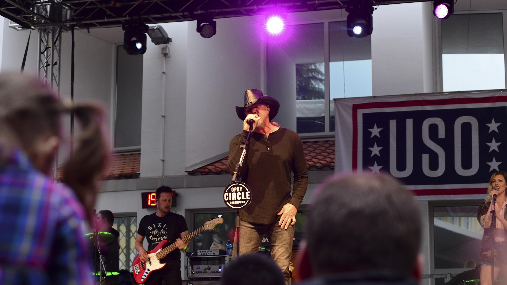 Trace Adkins, Grammy Award–nominated country music singer, performs for a crowd of Airmen and their families at Aviano Air Base, Italy, May 12, 2017.  The performance is part of his 12th USO tour. (Photo by U.S. Air Force Airman 1st Class Ryan Brooks)