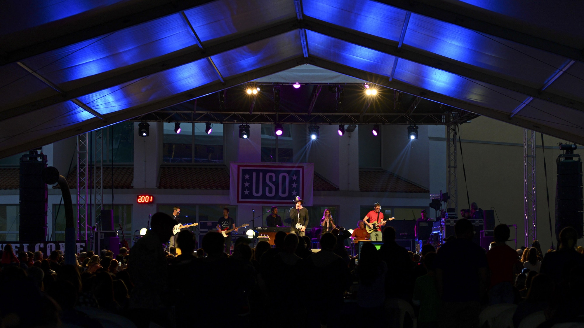 Trace Adkins, Grammy Award–nominated country music singer, performs for a crowd of Airmen and their families at Aviano Air Base, Italy, May 12, 2017.  The performance is part of his 12th USO tour. (Photo by U.S. Air Force Airman 1st Class Ryan Brooks)