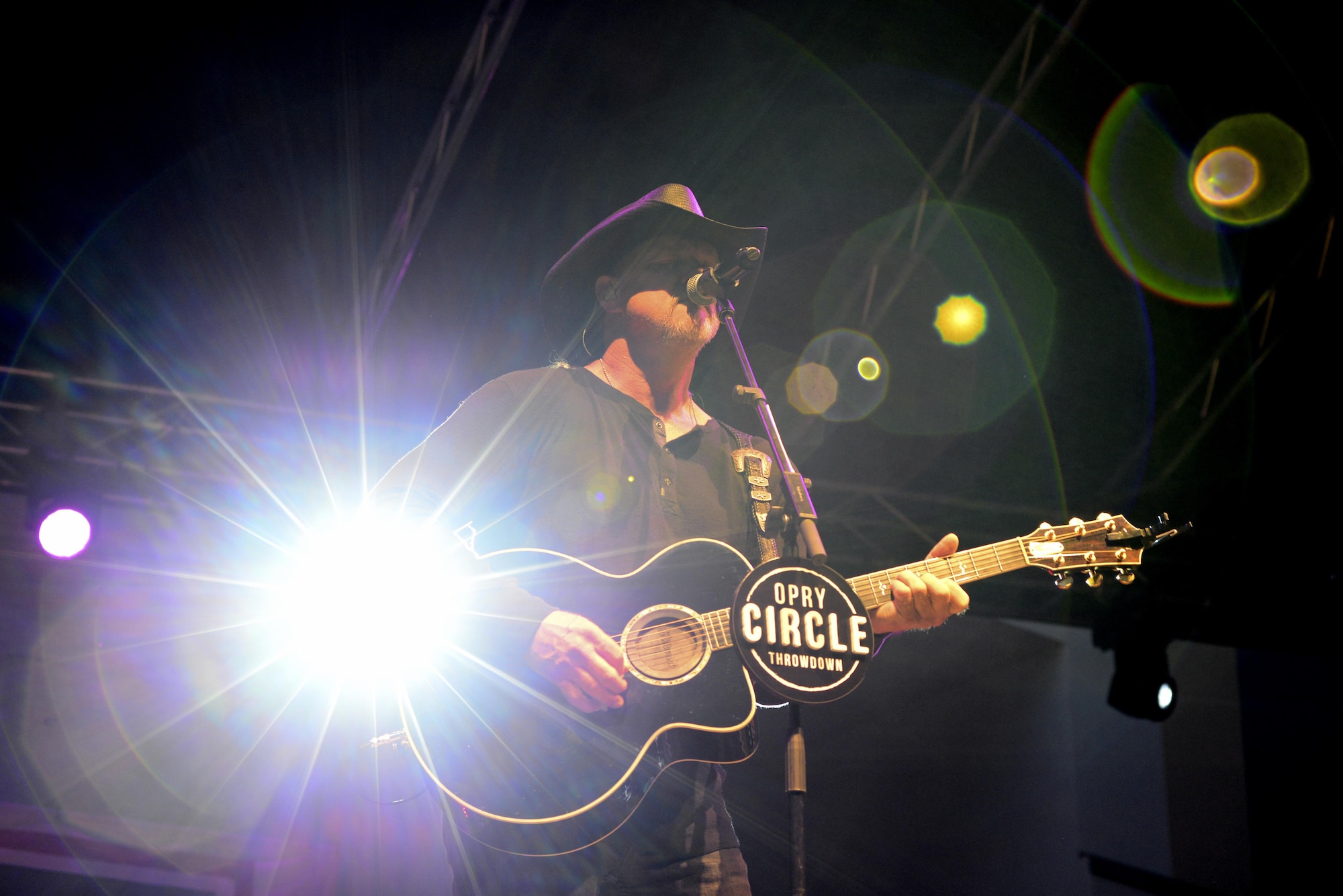 Trace Adkins, country music entertainer, sings during a concert at Aviano Air Base, Italy, May 12, 2017. This is part of Adkins’ Spain and Italy USO tour. (Photo by U.S. Air Force Airman 1st Class Ryan Brooks)