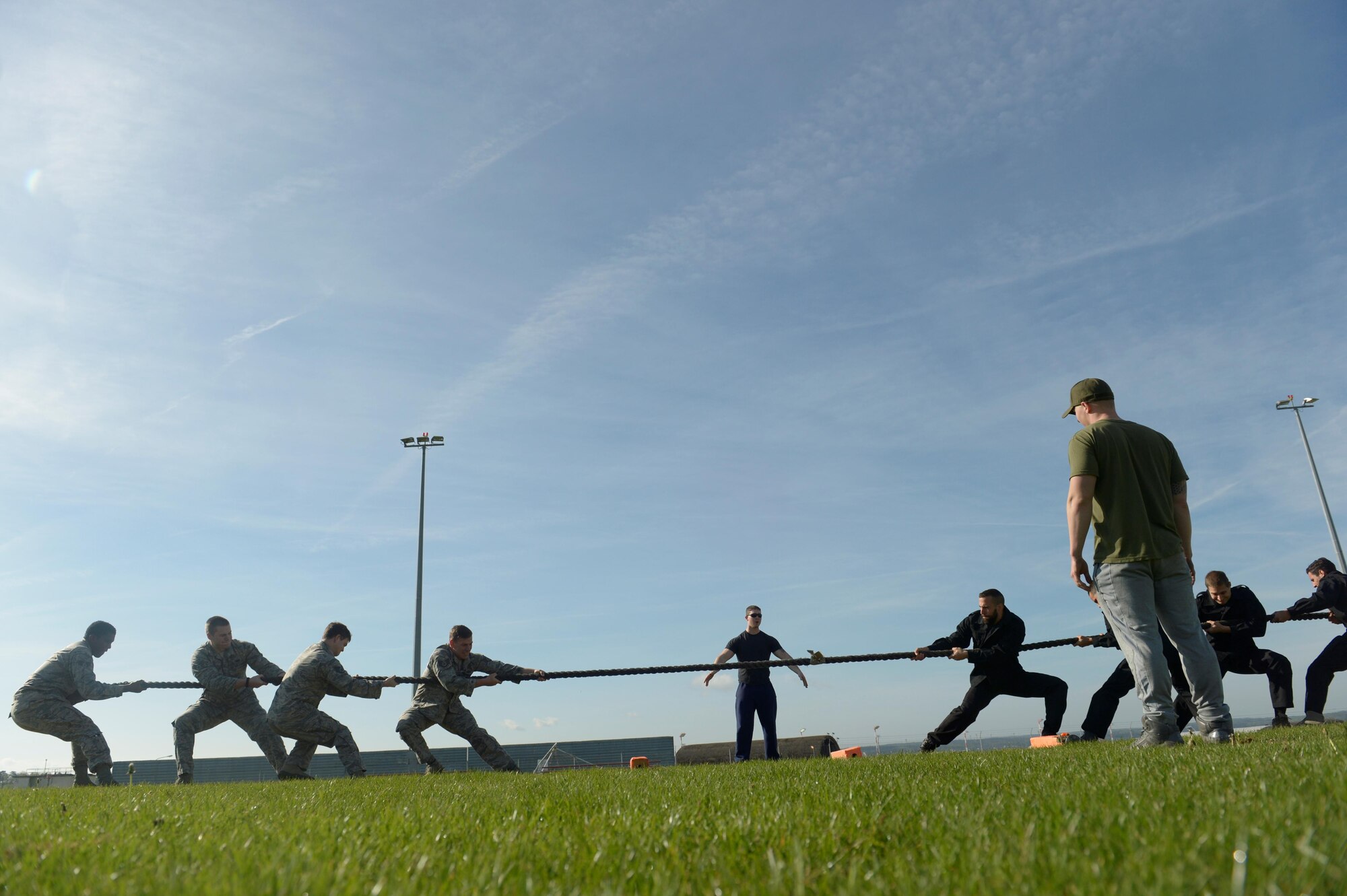 Airmen assigned to the 52nd Security Forces Squadron, left, compete against Luxembourg SWAT members in tug-of-war event during the Battle of the Badges at Spangdahlem Air Base, Germany, May 15, 2017. The event was part of National Police Week to recognize the service and sacrifice of law enforcement officers. (U.S. Air Force photo by Staff Sgt. Jonathan Snyder)
