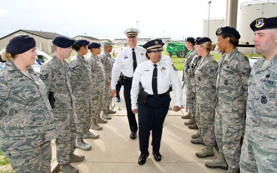 Members of the 436th Security Forces Squadron welcome Chief Inspector Cynthia Dorsey, Support Services, and Chief Inspector Christopher Werner, Training & Education Services, both from the Philadelphia Police Department, Philadelphia, Pa., to the squadron, May 11, 2017, at building 910 on Dover Air Force Base, Del. Fifteen members of the police department received a mission brief from the 436th SFS at the beginning of their visit. (U.S. Air Force photo by Roland Balik)