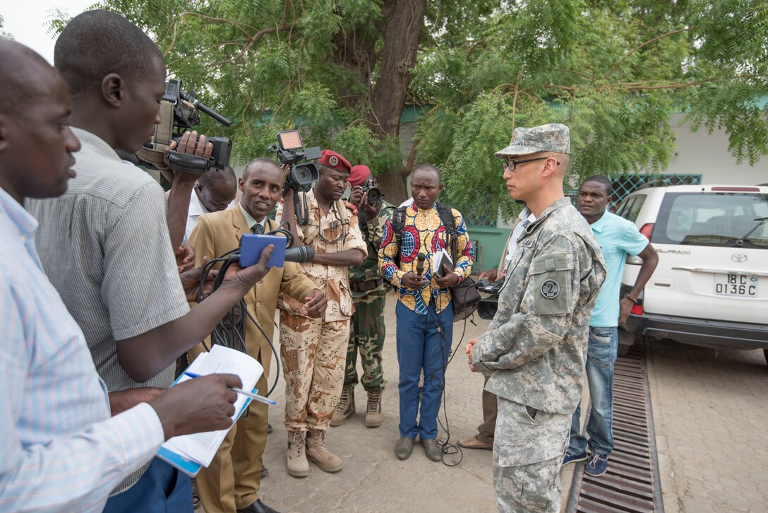 U.S. Army Reserve Maj. Eric Chang, an infectious disease doctor, is interviewed by local media during Medical Readiness Training Exercise 17-3 at the Military Teaching Hospital in N'Djamena, Chad, May 11. The mutually beneficial exercise offers opportunities for the partnered militaries to share best practices and improve medical treatment processes. (U.S. Army Africa photo by Staff Sgt. Shejal Pulivarti)