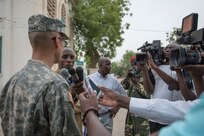 U.S. Army Reserve Maj. Eric Chang, an infectious disease doctor, is interviewed by local media during Medical Readiness Training Exercise 17-3 at the Military Teaching Hospital in N'Djamena, Chad, May 11. The mutually beneficial exercise offers opportunities for the partnered militaries to share best practices and improve medical treatment processes. (U.S. Army Africa photo by Staff Sgt. Shejal Pulivarti)