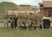 The 91st Security Forces Group Global Strike Challenge team poses for a group photo at Minot Air Force Base, N.D., May 1, 2017. The team trained in preparation for the upcoming competition, which challenges physical fitness, security forces tactics, job knowledge and weapons firing. (U.S. Air Force photo/Airman 1st Class Jessica Weissman)