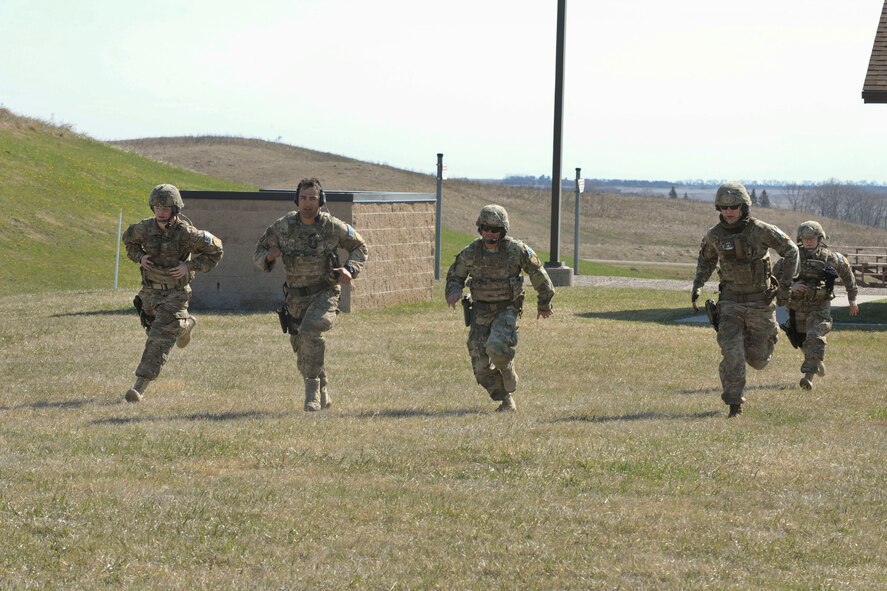 Members of the 91st Security Forces Group Global Strike Challenge team run during training at Camp Grafton South, Devil’s Lake, N.D., May 4, 2017. The team trained in preparation for the upcoming competition, which challenges security forces tactics, job knowledge and weapons firing. (U.S. Air Force photo/Airman 1st Class Jessica Weissman)