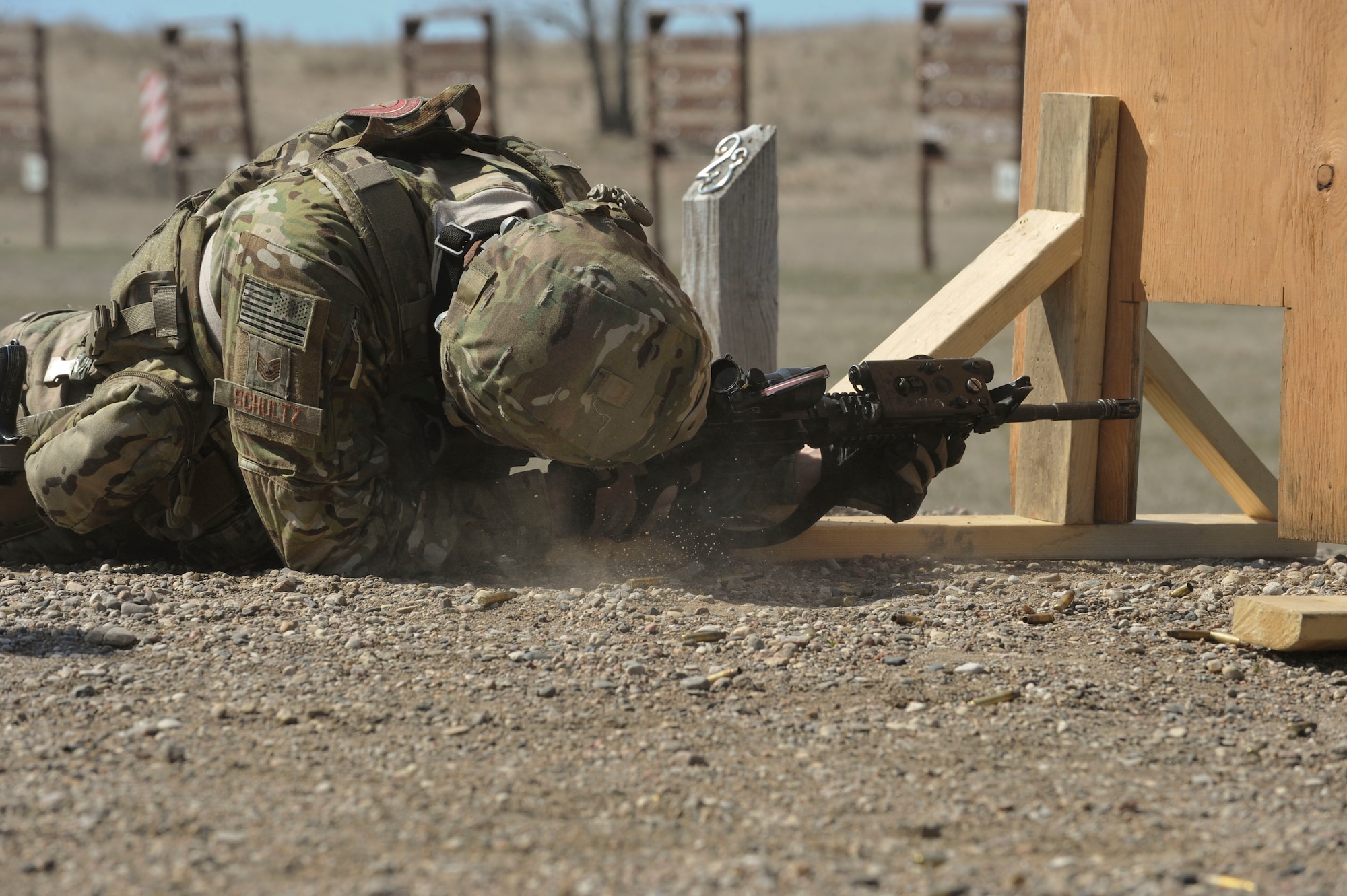 Tech. Sgt. Christopher Schultz, 91st Security Support Squadron training NCO in charge, fires an M4 carbine at Camp Grafton South, Devil’s Lake, N.D., May 4, 2017. The team trained in preparation for the upcoming competition, which challenges security forces tactics, job knowledge and weapons firing. (U.S. Air Force photo/Airman 1st Class Jessica Weissman)
