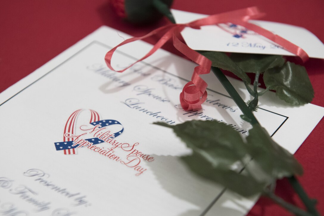 A Military Spouse Appreciation Luncheon brochure sits on a table during the luncheon inside The Club at Joint Base Andrews, Md., May 12, 2017. Military Spouse Appreciation Day is always the Friday before Mother’s Day. (U.S. Air Force photo by Senior Airman Philip Bryant)