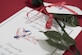 A Military Spouse Appreciation Luncheon brochure sits on a table during the luncheon inside The Club at Joint Base Andrews, Md., May 12, 2017. Military Spouse Appreciation Day is always the Friday before Mother’s Day. (U.S. Air Force photo by Senior Airman Philip Bryant)