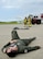 Capt. Matt McKay, a pilot trainee with the 757th Airlift Squadron here, portrays an accident victim during a Major Accident Response Exercise (MARE), May 16, 2017, while installation firefighters arrive and coordinate their initial response. The purpose of the exercise, conducted by the Wing Inspection Team and Emergency Management office, was to document response capabilities of installation personnel while honing joint response practices with local agencies including local law enforcement and the American Red Cross. (U.S. Air Force photo/Eric White)