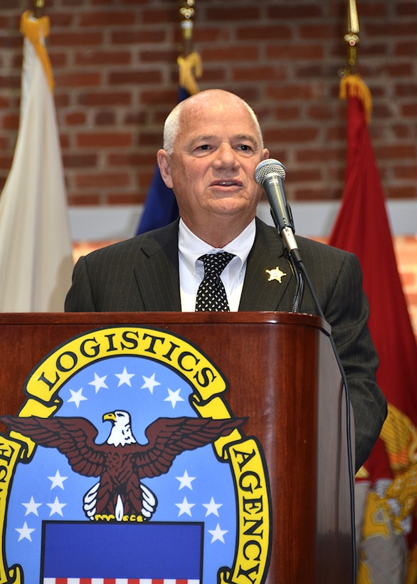 Retired Chesterfield County Sheriff Dennis Proffit speaks to attendees at a ceremony May 11, 2017 honoring fallen law enforcement officers in the Frank B. Lotts Conference Center on Defense Supply Center Richmond, Virginia.