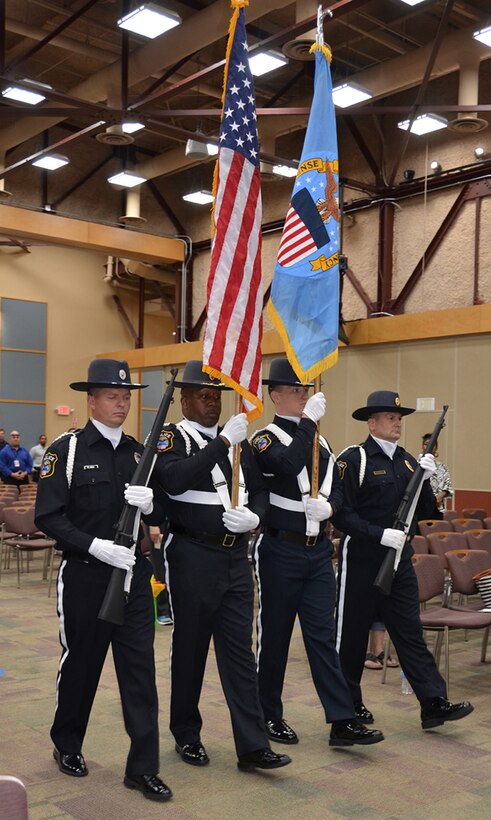 Defense Logistics Agency Installation Support at Richmond Police Honor Guard posts the colors during a ceremony May 11, 2017 honoring fallen law enforcement officers in the Frank B. Lotts Conference Center on Defense Supply Center Richmond, Virginia.
