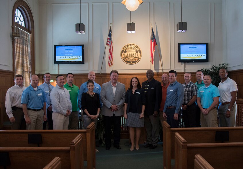 Members of Leadership Moody pose for a photo with leadership from the City of Valdosta Ga., May 12th, 2017, at Valdosta City Hall.  Leadership Moody is a development leadership program at Moody Air Force Base where selected Senior Non-Commissioned Officers, Field Grade Officers, and civilians gain leadership insights from local area leaders in government, education or other community agencies. (U.S. Air Force Photo by Capt. Korey Fratini)