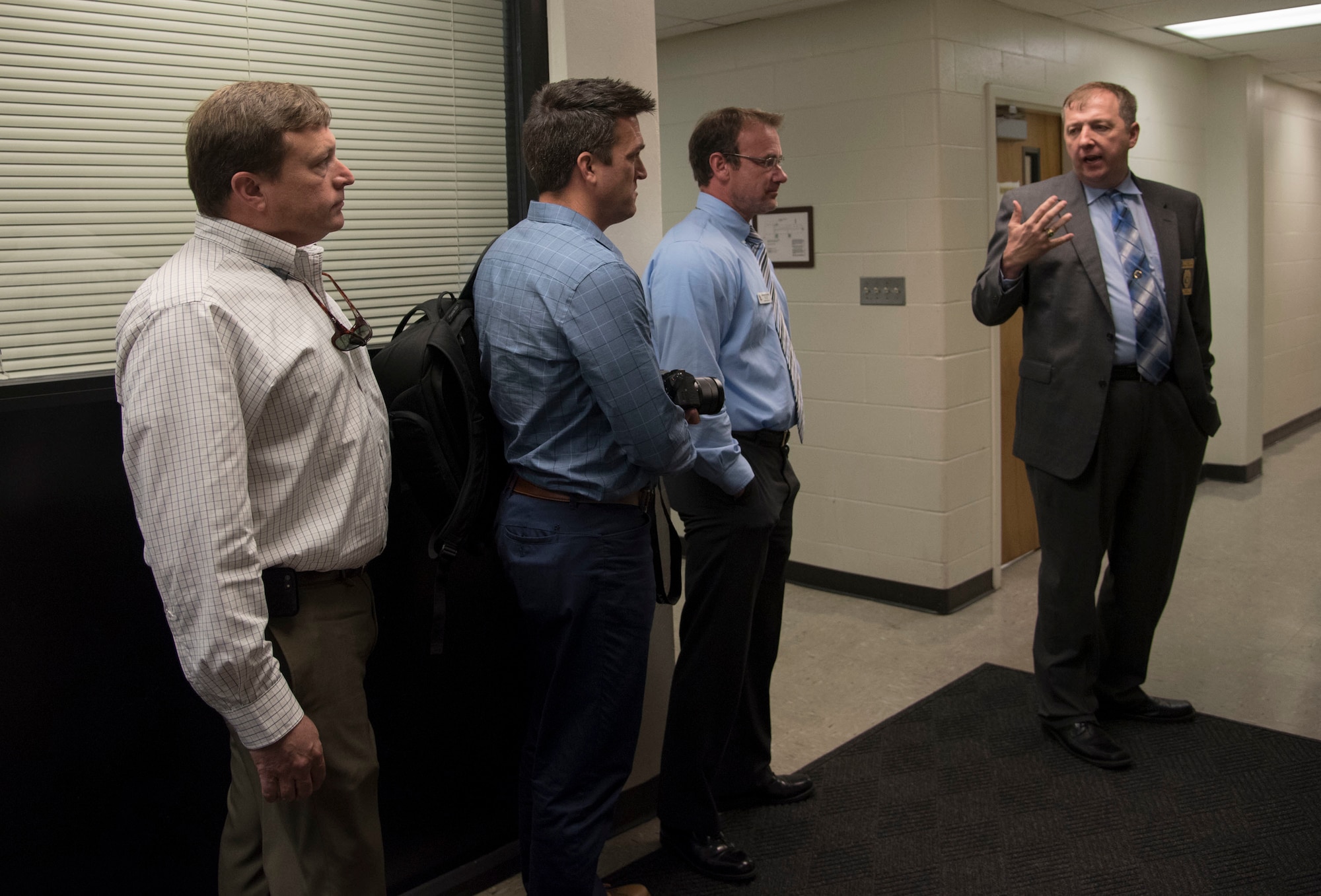 Valdosta Chief of Police Brian Childress, gives a tour of the Valdosta police department to members of Leadership Moody, May 12th, 2017, at the Valdosta, Ga., Police Department.  Leadership Moody is a development leadership program at Moody Air Force Base where selected Senior Non-Commissioned Officers, Field Grade Officers, and civilians gain leadership insights from local area leaders in government, education or other community agencies. (U.S. Air Force Photo by Capt. Korey Fratini)