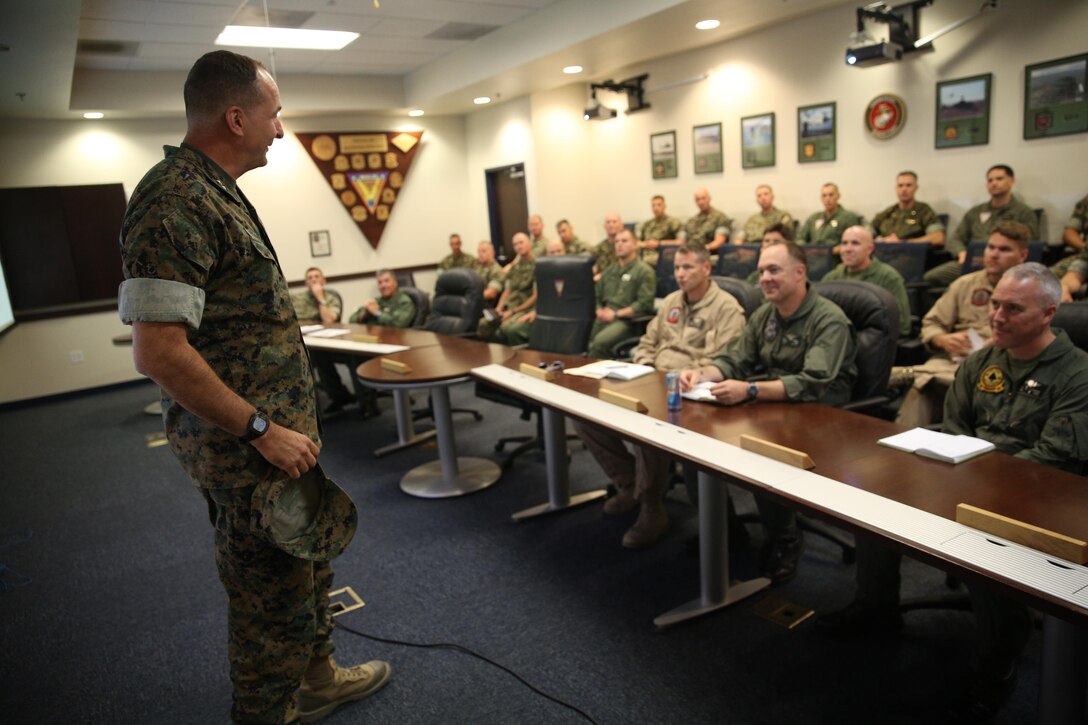 Maj. Gen. Daniel O’Donohue, commanding general of 1st Marine Division, speaks about Marine Aircraft Group (MAG) 39 and 1st MARDIV’s integration during an award ceremony at Marine Corps Air Station Camp Pendleton, Calif., May 15. 1st MARDIV recognized MAG-39 as an honorary member for continuing to support the ground Marines and constantly working toward more advanced MAGTF integration. (U.S. Marine Corps photo by Lance Cpl. Jake M.T. McClung/Released)