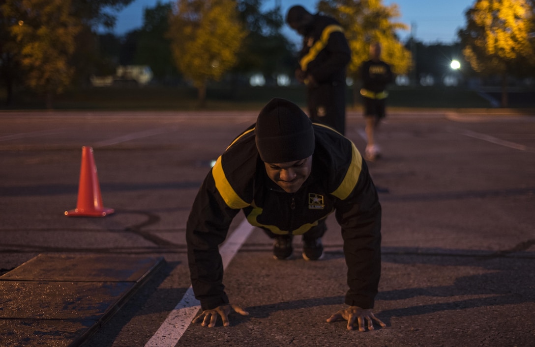Sgt. 1st Class Francis Reyes, 2017 U.S. Army Human Resources Command Noncommissioned Officer of the Year, performs push-ups during the APFT portion of the HRC Best Warrior Competition held at Fort Knox, Ky., May 8-11, 2017. Reyes along with Sgt. Kandy Christian, 2017 U.S. Army Human Resources Command Soldier of the Year now move on to the Fort Knox Installation competition held on post 21-25 May (U.S. Army photo by Master Sergeant Brian Hamilton/ released)