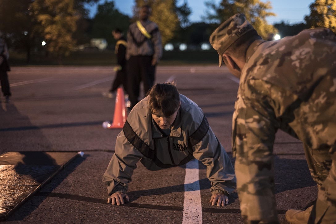 Sgt. Kandy Christian, 2017 U.S. Army Human Resources Command Soldier of the Year, performs push-ups during the HRC Best Warrior Competition held at Fort Knox, Ky., May 8-11, 2017. Christian along with Sgt.1st Class Francis Reyes, 2017 U.S. Army Human Resources Command Noncommissioned Officer of the Year now move on to the Fort Knox Installation competition held on post 21-25 May. (U.S. Army photo by Master Sergeant Brian Hamilton/ released)