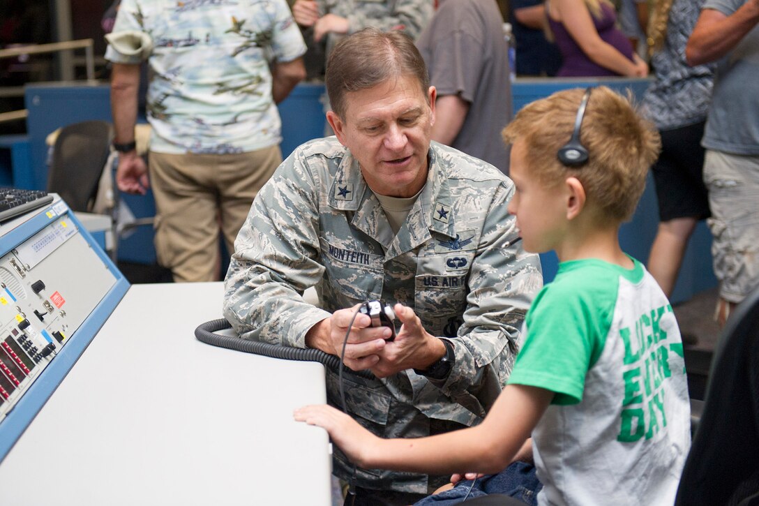 Brig. Gen. Wayne Monteith, 45th Space Wing commander, describes launch operations to a space enthusiasts during the 2017 Cape Family Day April 29, 2017, at Cape Canaveral Air Force Station, Fla. The 45th Space Wing and the Naval Ordnance Test United hosted Cape Family Day to showcase operations for Airmen and their families. More than 2,300 visitors received a rare opportunity and an insider's look at the World’s Premier Gateway to Space at the Cape. (U.S. Air Force photo by Phil Sunkel)  