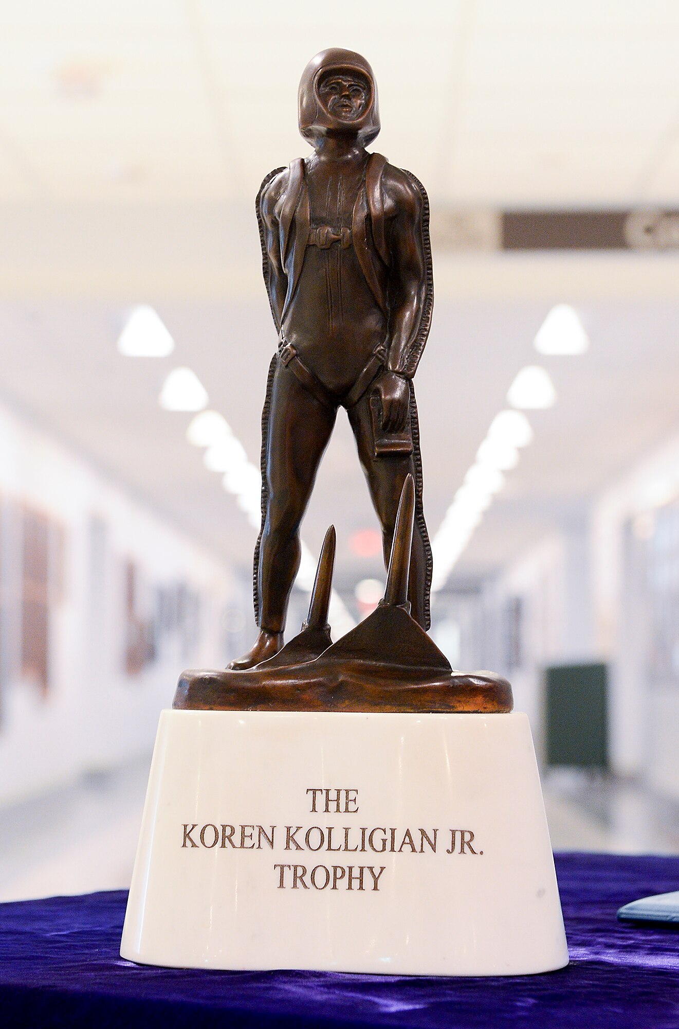 Maj. John Hourigan, a 123rd Operations Support Squadron C-130 Hercules pilot, receives the Koren Kolligian Trophy from Air Force Vice Chief of Staff Gen. Stephen Wilson in the Pentagon, Washington, D.C., May 17, 2017. (U.S. Air Force Photo/Andy Morataya)