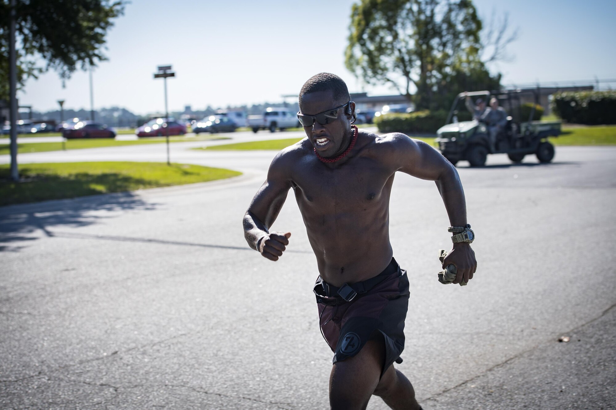 A competitor sprints the run portion of the Police Week Quadathalon, May 15, 2017, at Moody Air Force Base, Ga. Teams of four participated in a swim, run, bike and ruck march competition, where the team with the fastest time won bragging rights. Overall, Police Week is designed to honor the legacies fallen officers, both civilian and military, have left behind, but it also gives various sections within the law enforcement community an opportunity to train together in friendly competitions. (U.S. Air Force photo by Senior Airman Janiqua P. Robinson)